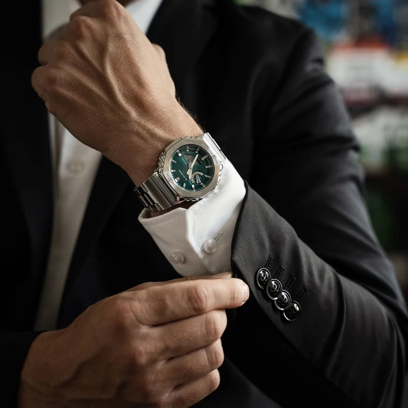 Casio G-Shock GM-2110D-3A1ER Herrenuhr • Metalllünette & Metallarmband • Analog-Digital